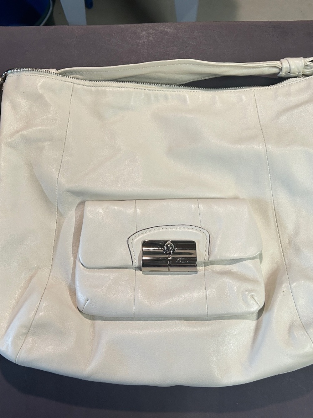 Women's white Coach tote handbag with wallet
